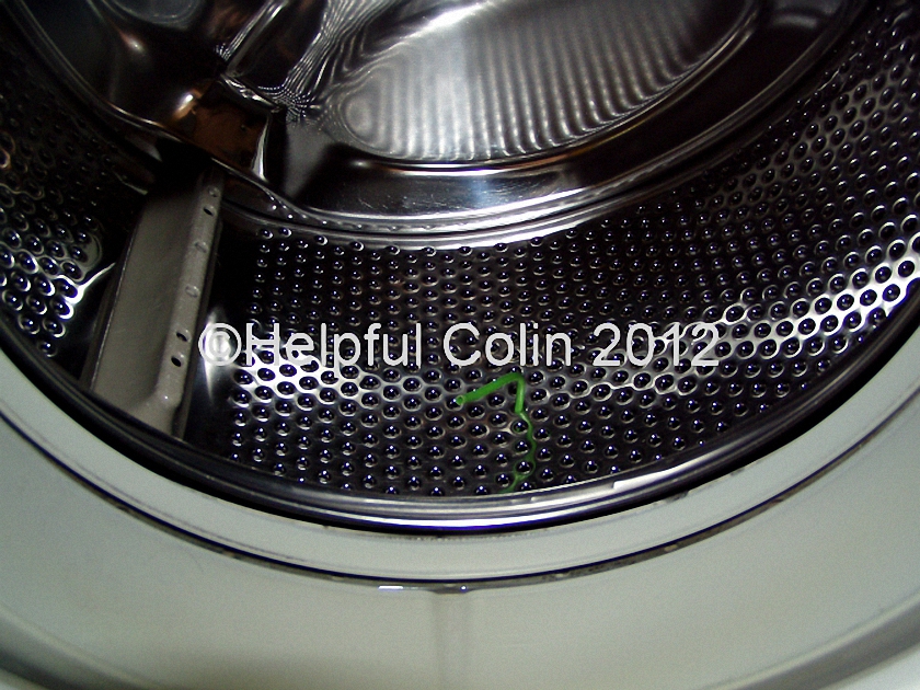 https://helpfulcolin.com/wp-content/uploads/2012/08/Washing-Machine-Drum-With-Bra-Wire-%C2%A9.jpg